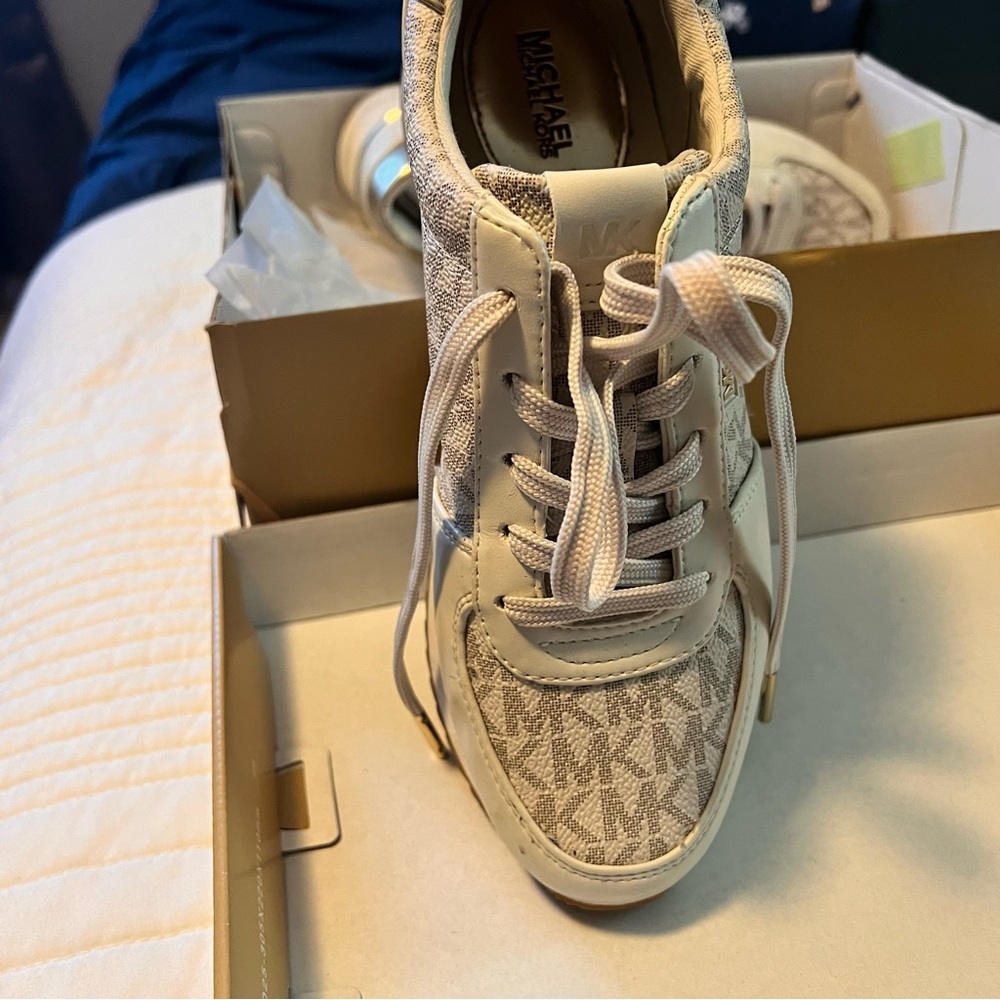 Michael Kor tennis shoe.